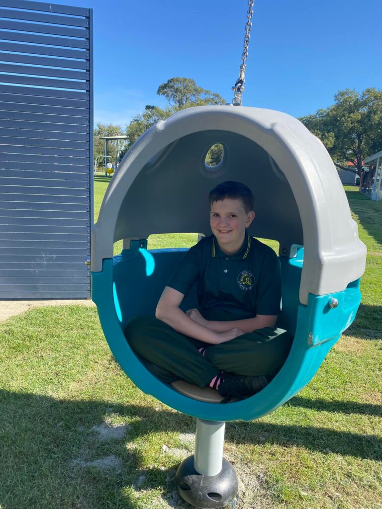 Rocklea school student enjoying the sensory pods 3